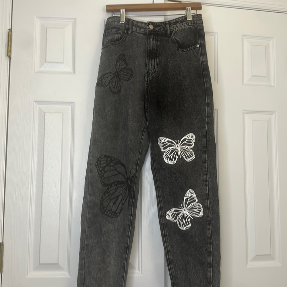 Black straight jeans with butterflies